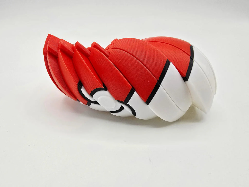Pokéball Twist Fidget, pocket-sized red and white segmented sensory toy.