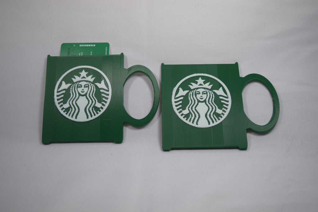 Starbucks mug gift card holder, green 3D-printed plastic with white Starbucks logo, two pieces.
